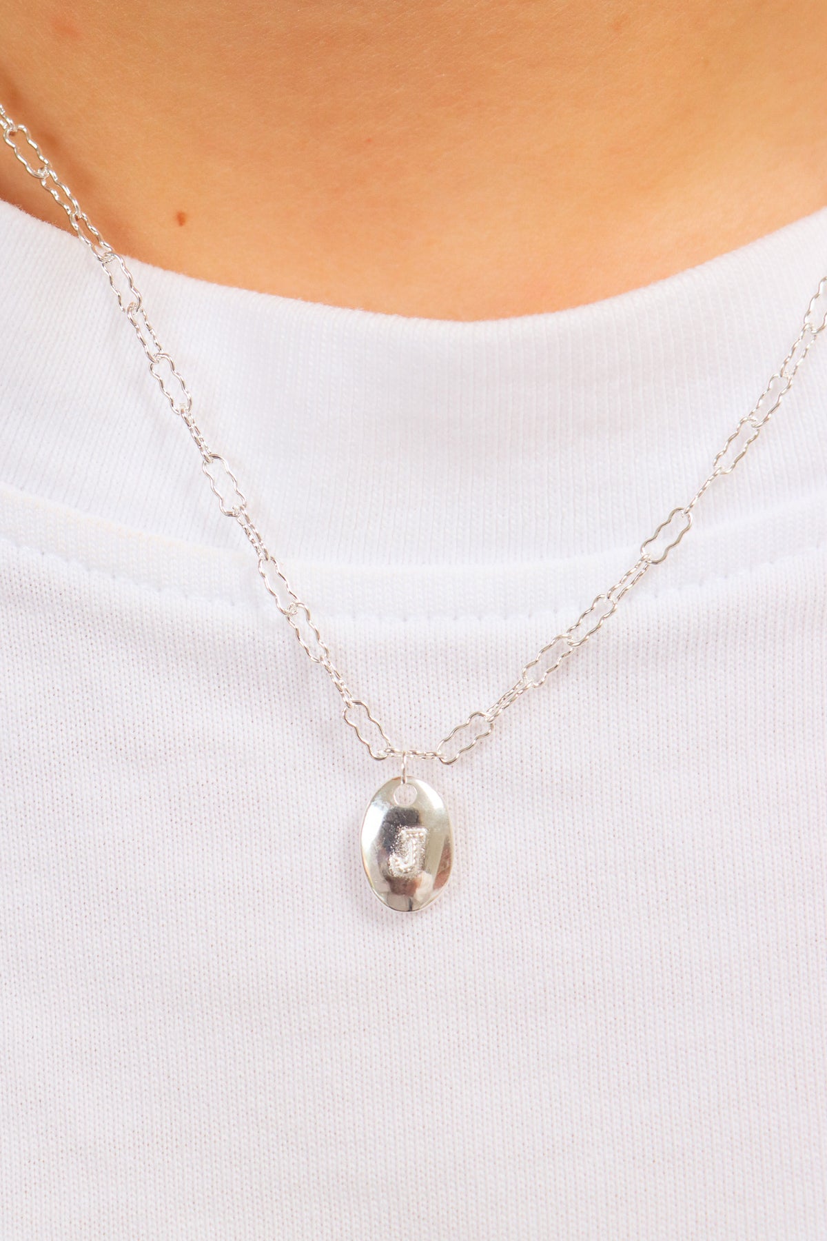 Dots letter charm silver