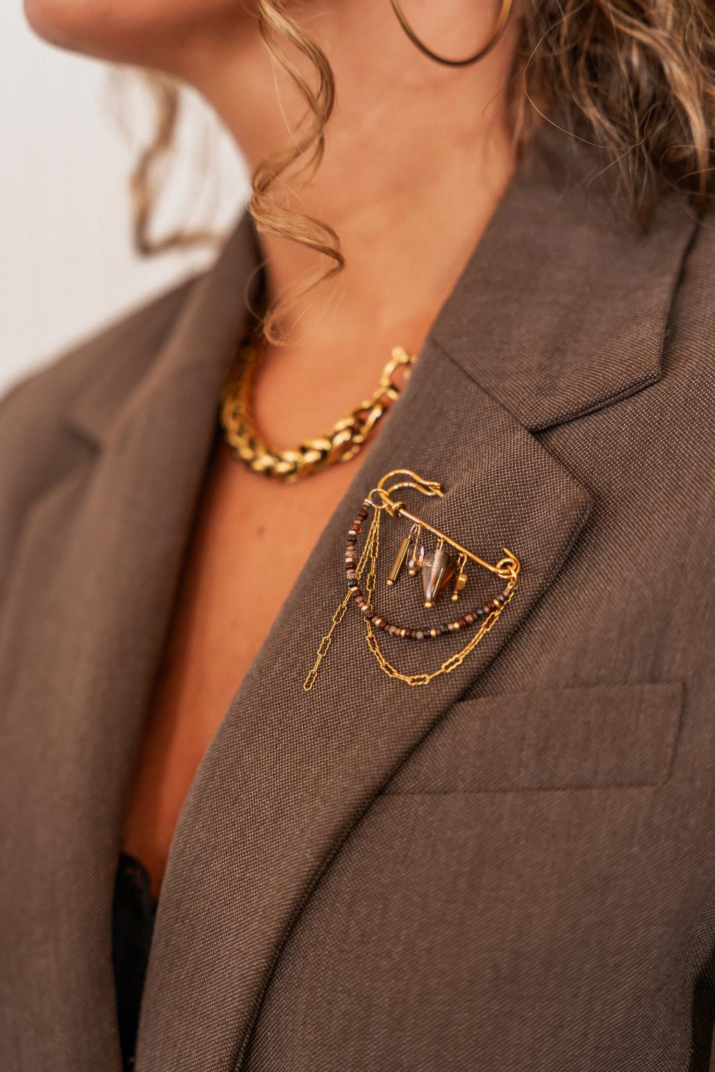 Secret embrace broche gold