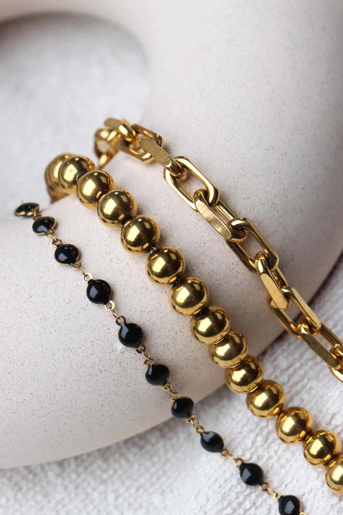 Black round bracelet gold