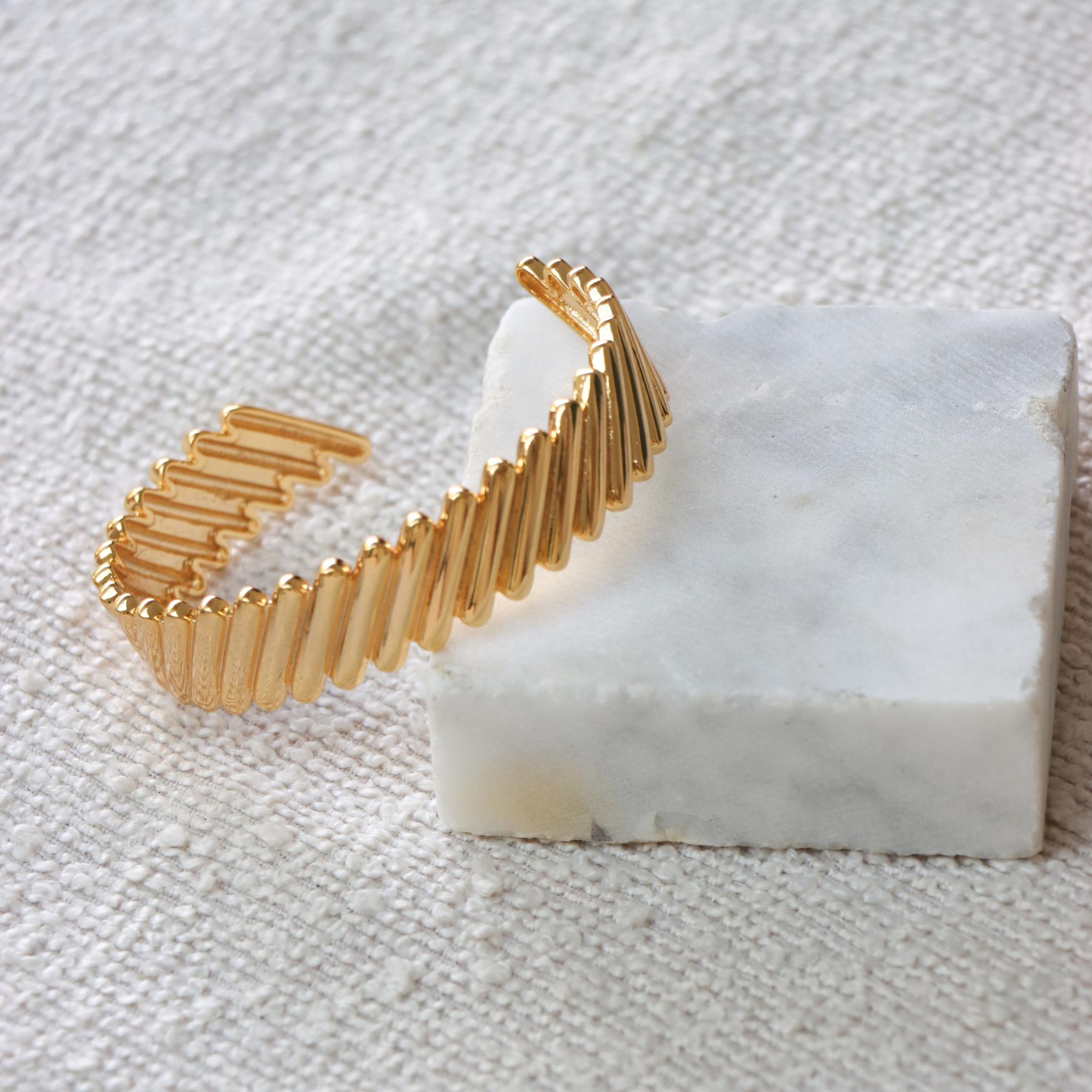 Golden twist bangle gold