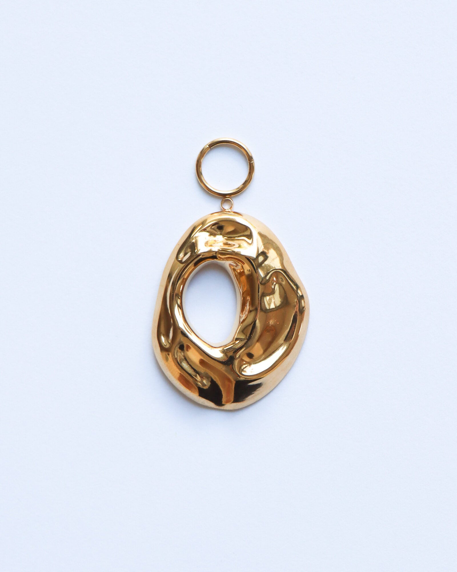 Open oval charm gold