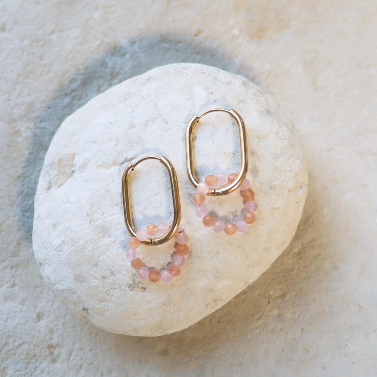 Oval orange hoop gold