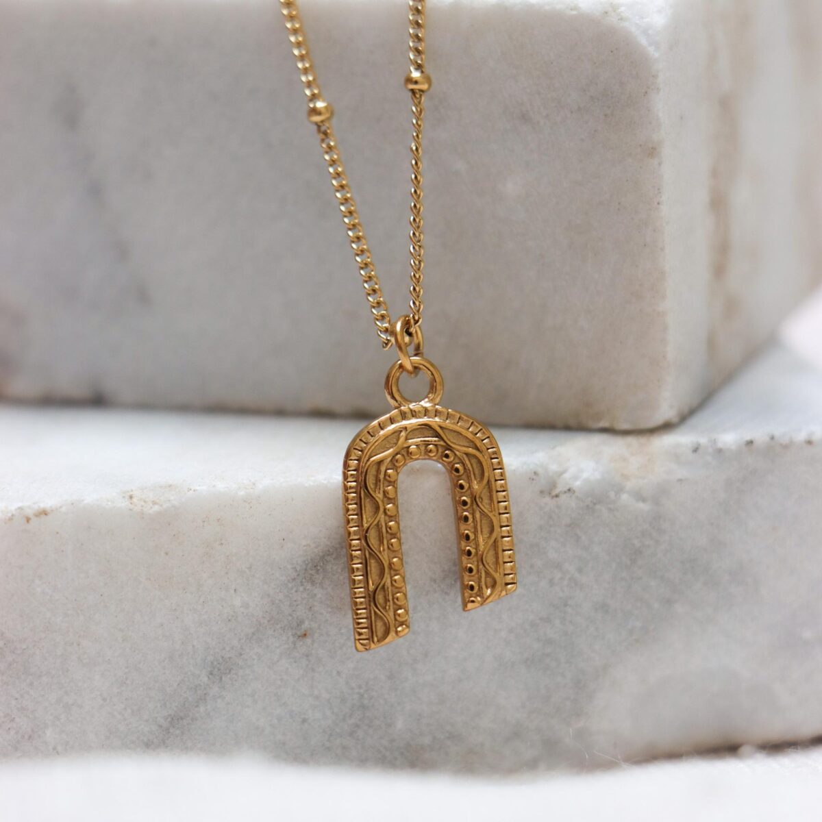 Rainbow twirl necklace gold