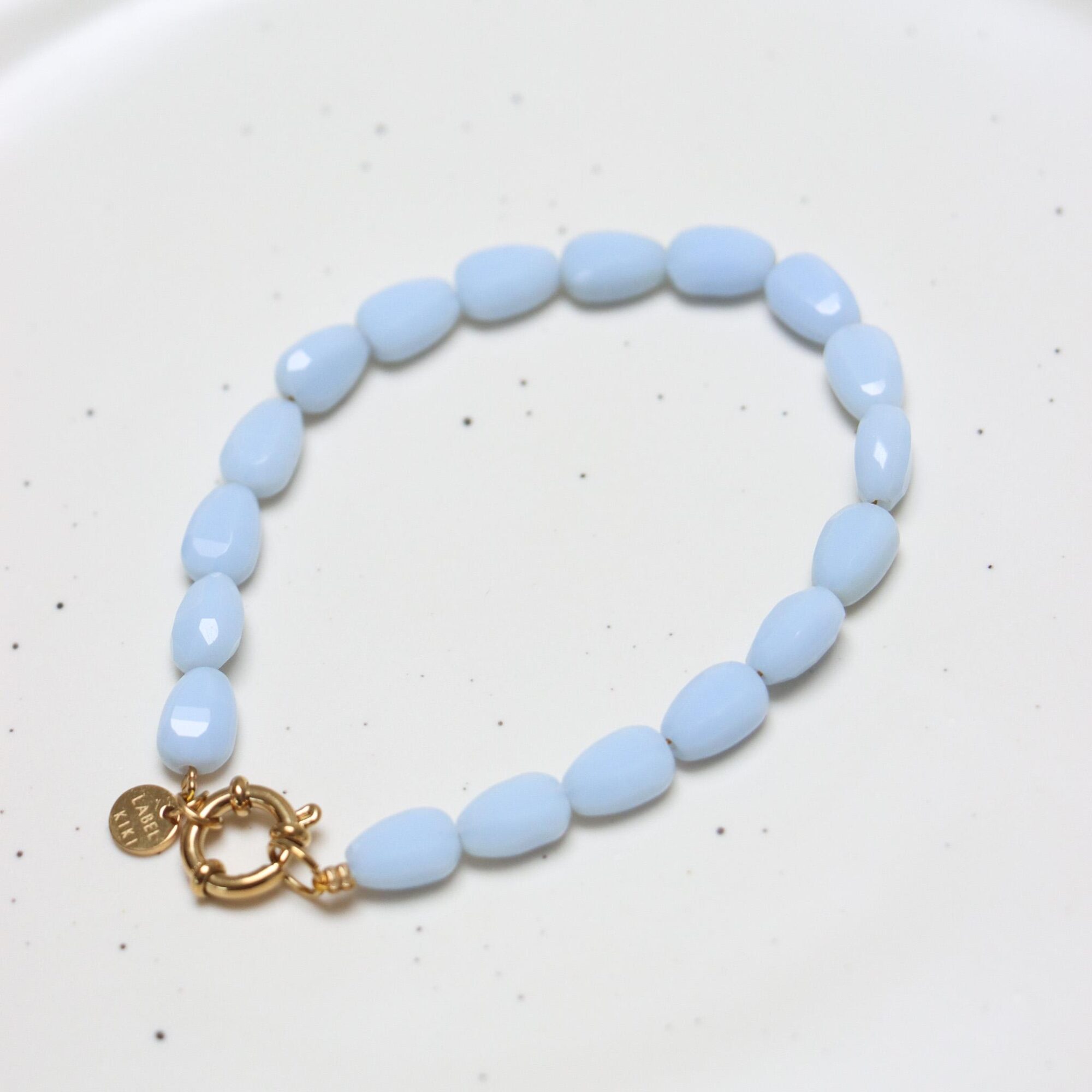 Shades of blue bracelet gold