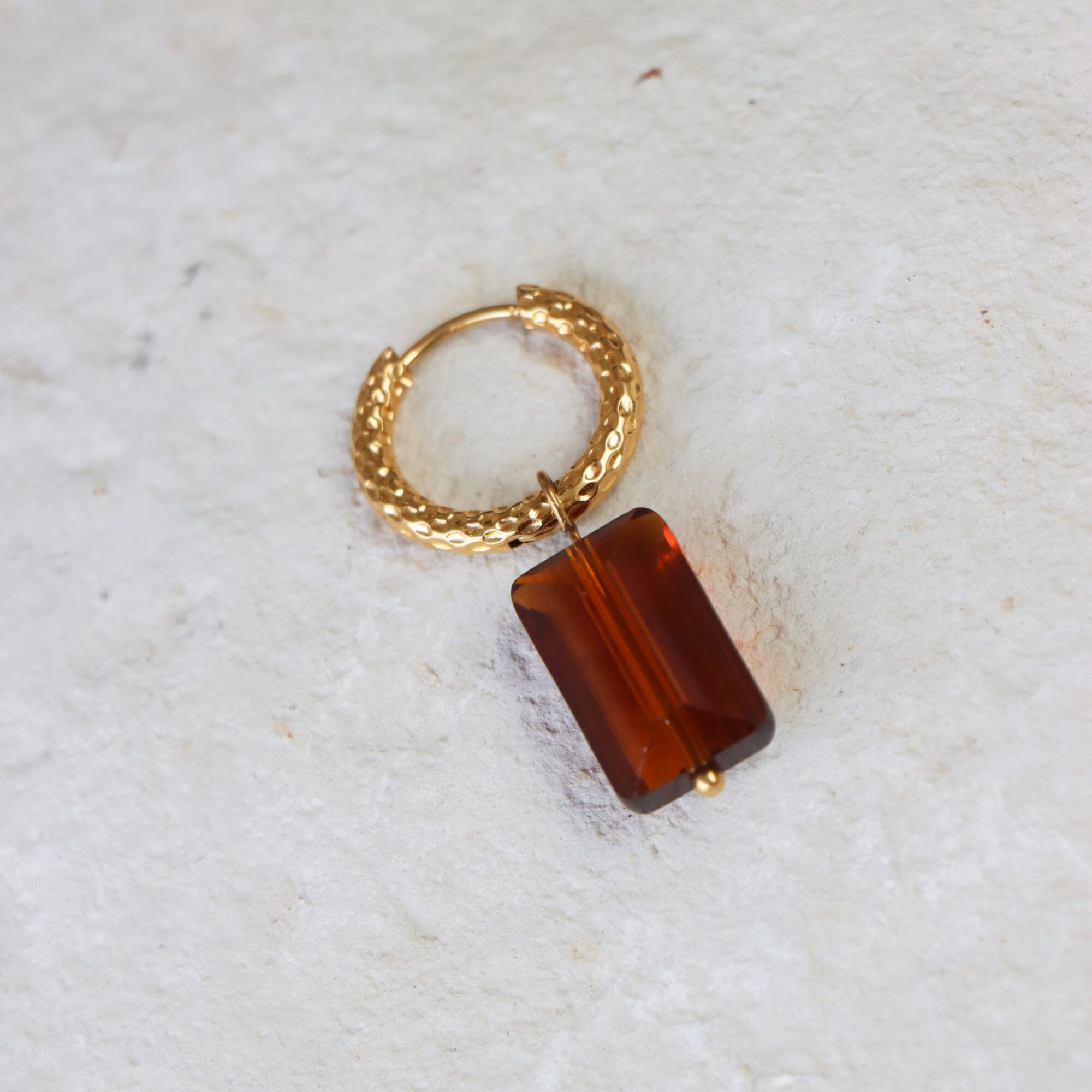 Shiny brown hoop gold