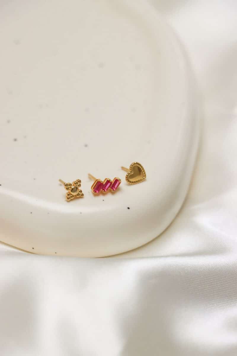 Triple magenta gold