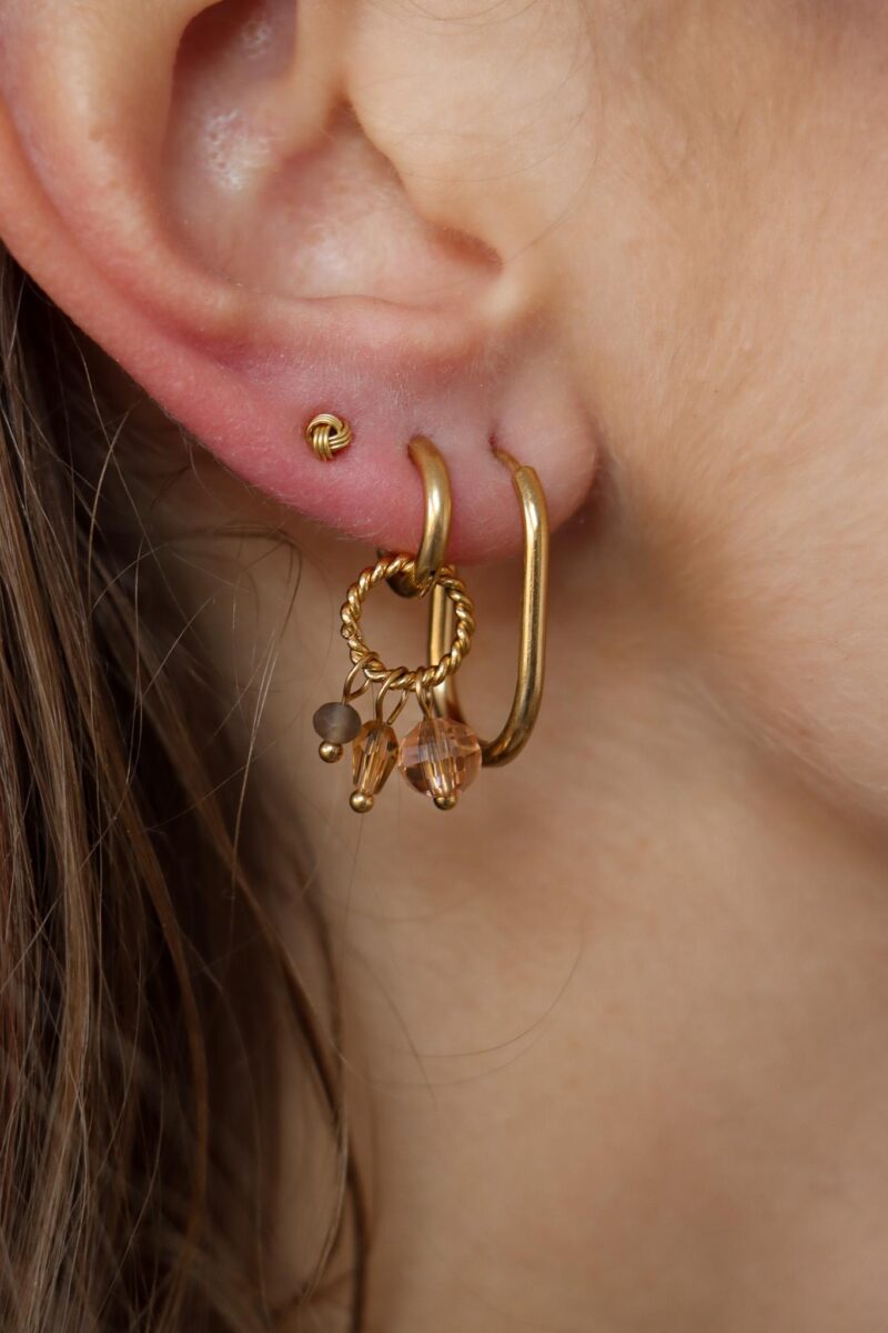 Twisted stones hoop gold